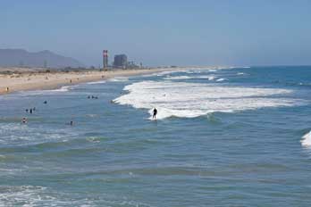 surfing at  Hueneme Beach, Ventura County, CA