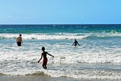 swimmers in surf at La Jolla, San Diego County, CA